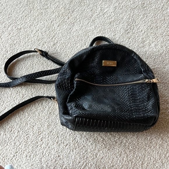 BCBG Handbags - BCBG Black faux snakeskin backpack
